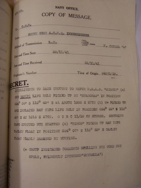 Naval signal reporting the recovery of a Carley float by HMAS Heros.